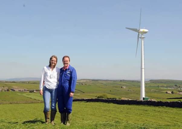 Emma and Jonathan Sharp with their wind turbine