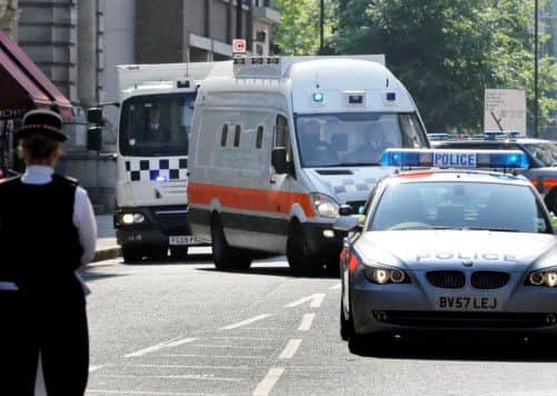 Police vans believed to be carrying six Islamic extremists, who will be sentenced today for planning a murderous attack on an English Defence League rally, at the Old Bailey