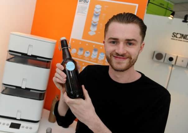 Product design student Jack Martin with his home brewing product 'Brau'