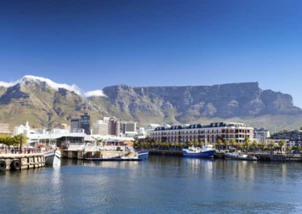 Boats moored in harbour under Table Mountain, Cape Town, South Africa