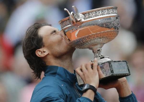 Spain's Rafael Nadal holds the trophy