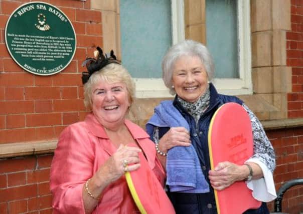 Sylvia Grice (right)  who has taught generations of Ripon people to swim  unveiled the new plaque on the wall of the Ripon Spa baths  watched by  Cllr Pat Jones  the member for Cultural Services on Harrogate Council .