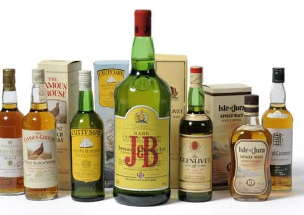A rare collection of bottles of Scotch each signed by a former Prime Minster have smashed their predicted selling price at auction.