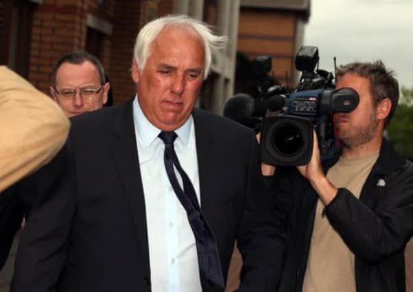 Neville Neville, the father of former Premier League footballers Gary and Phil leaves Bury Magistrates Court charged with a sex assault.