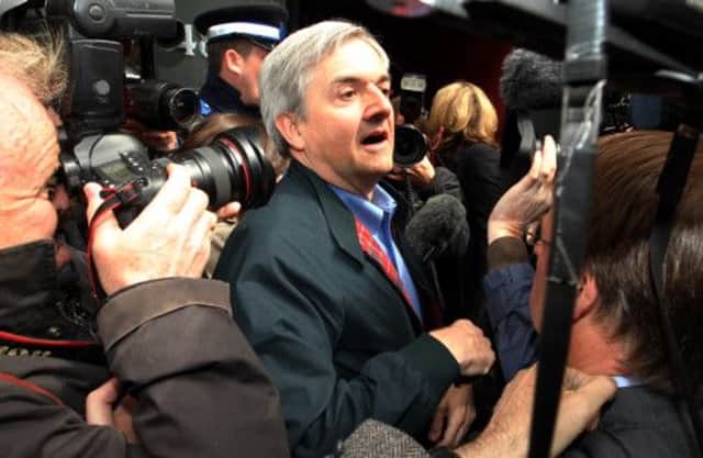 Chris Huhne faces the media on his release from prison