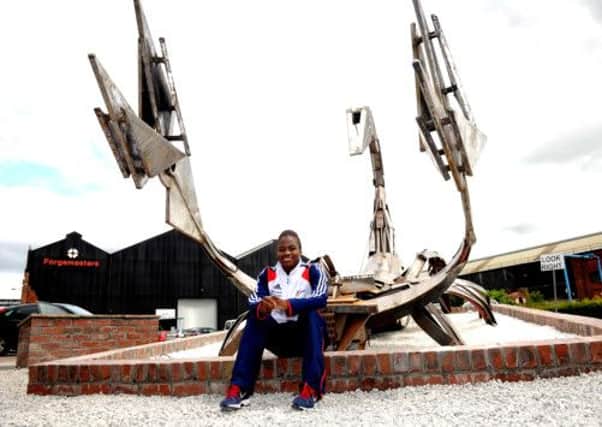 Olympic gold medallist Nicola Adams unveils Sheffield Forgemasters' new Scorpion sculpture with help from the company's apprentices.
