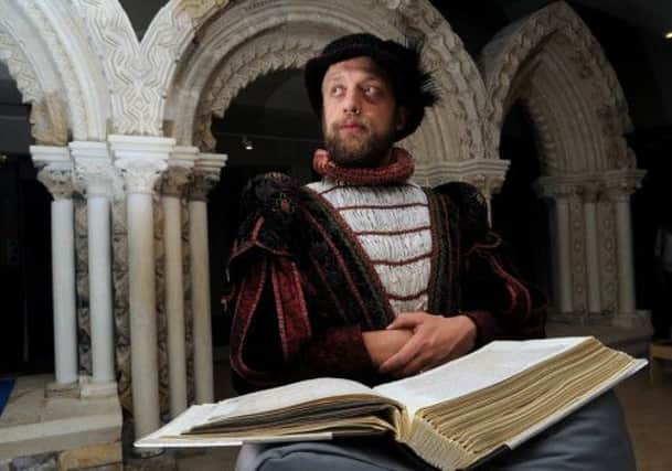Michael Lambourne as Richard III with York Council archives that record the king's death