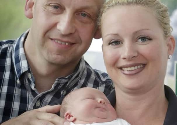 Baby Eva, the first baby conceived using new IVF technique, the Early Embryo Viability Assessment (Eeva) test, with mother Susan Walker-Dempster and father David Dempster