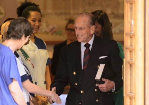 The Duke of Edinburgh thanks staff as he leaves the London Clinic in central London, 11 days after he was admitted for exploratory abdominal surgery.