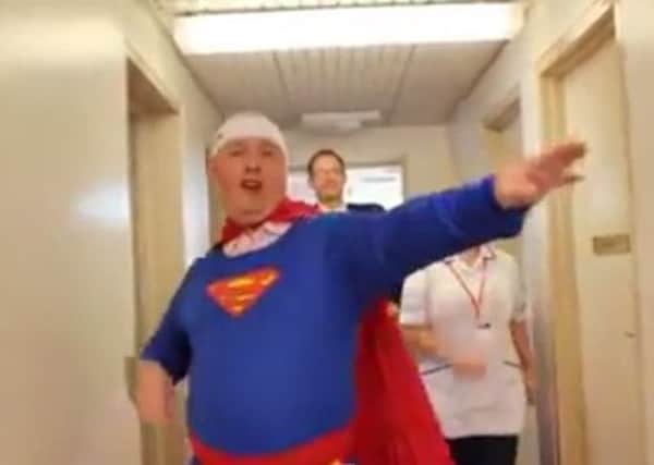 Chief executive of Hull and East Yorkshire Hospitals Trust Phil Morleys contribution to last weeks 'Workout at Work Day' in which he dresses up as Superman and dances through the corridors to the song Show Me the Way to Amarillo.