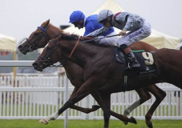 Dawn Approach ridden by Kevin Manning (left) before winning the St James's Palace Stakes ahead of Toronado ridden by Richard Hughes (right) during day one of the Royal Ascot meeting at Ascot Racecourse, Berkshire. (Picture: Steve Parsons/PA Wire)