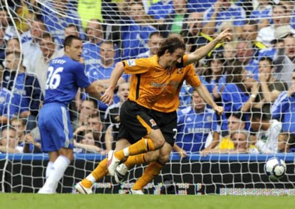 Hull City's Stephen Hunt celebrates scoring during the Barclays Premier League match at Stamford Bridge in 2009.