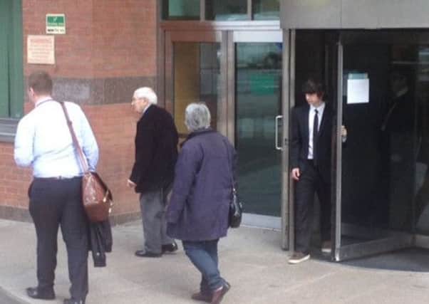 Charles Farrar, second left, leaves Sheffield Crown Court