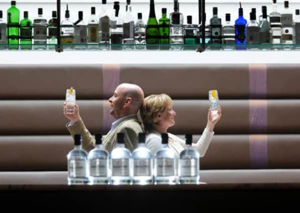 Karl Mason with his wife Catherine with Yorkshire's first Gin, at the New Ellington, York Place, Leeds. Picture by Simon Hulme
