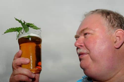 Head brewer Gary Sheriff with the nettle ale
