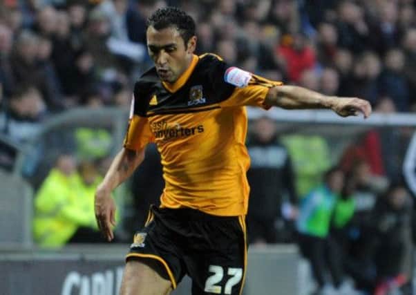 Ahmed Elmohamady has signed permanently for Hull.