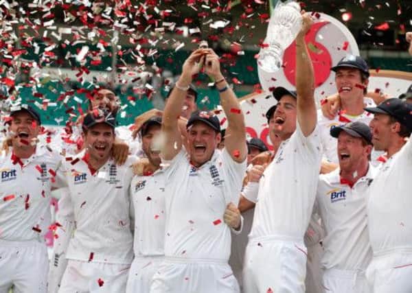 Andrew Strauss lifting the Ashes Urn in 2011.