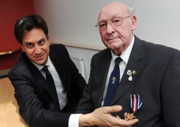 Artic Star war hero Frank Garbutt from Mexborough receives his medal from Ed Miliband MP