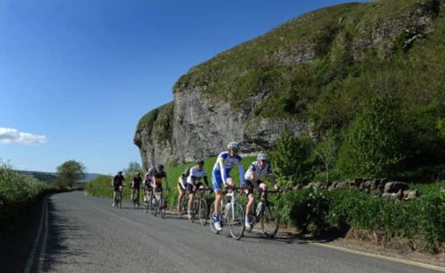 Cycol Rendezvous Tour guest riders pass Kilnsey Crag during a preview of the first stage of the 2014 Tour de France from Skipton which took in Kidstones and Buttertubs passes. 
Picture: Bruce Rollinson