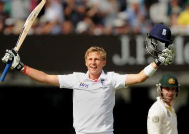England's Joe Root celebrates scoring 100 not out on day three of the Second Investec Ashes Test at Lord's