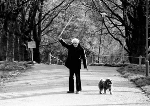 Mr Michael Foot, as he walks his dog 'Dizzy' on London's Hampstead Heath in 1983