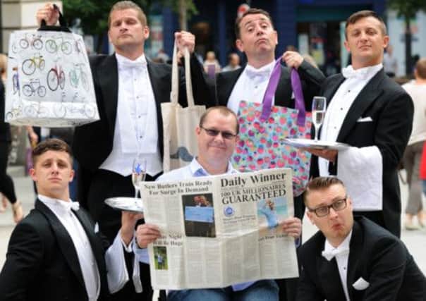 The butlers with Leeds lottery winner Andrew Lascelles, who scooped £4.4m.
