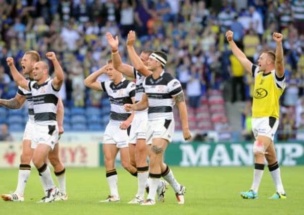 Hull FC celebrate victory over the Wolves and a place in the final against Wigan at Wembley.