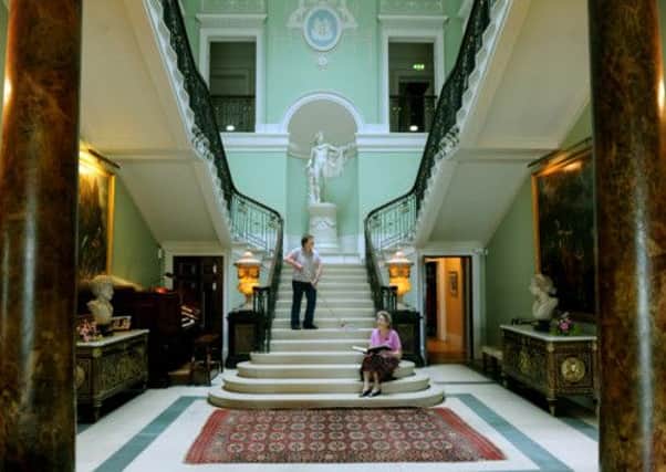 Cynthia Walker, head housekeeper (left) and Christine Clappison, senior steward on the main staircase at Sledmere House