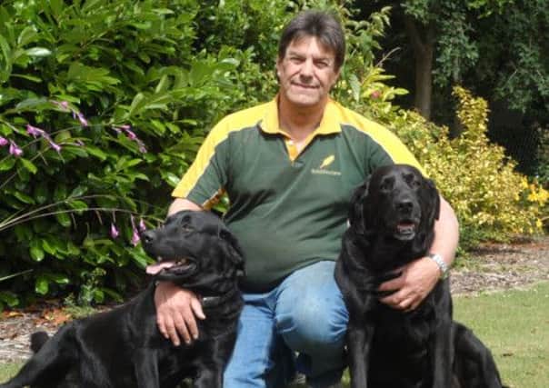 Jono Dixon with his dogs