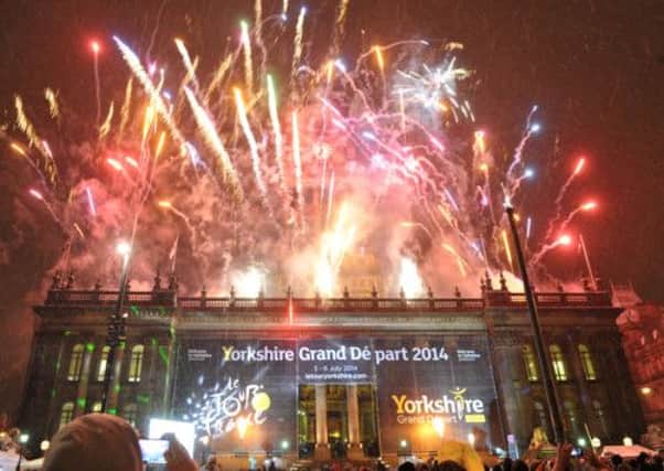 Fireworks light up the sky above Leeds Town Hall after the announcement of the 2014 Tour de France route.