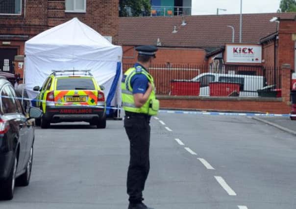 Police at the scene in Mexborough Road, Chapeltown , Leeds