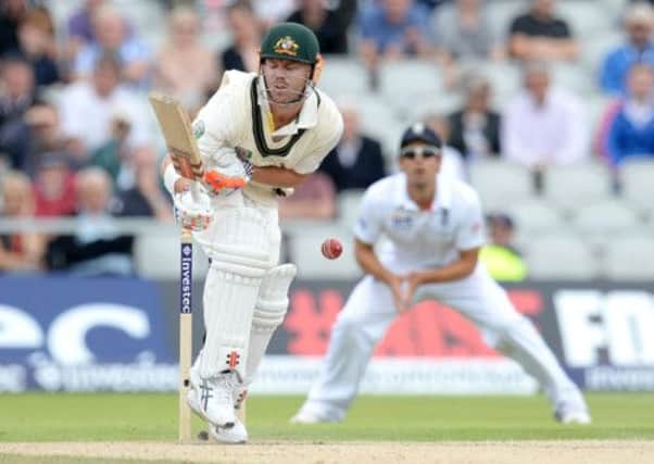 Australia's David Warner is hit by a delivery from England's Stuart Broad