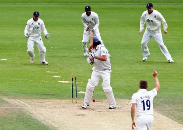Yorkshire's Ryan Sidebottom is bowled by Warwickshire's Chris Woakes.