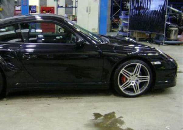 A Porsche 911 bought by an international gang who laundered almost £1.3 million from the Department for Environment and Rural Affairs