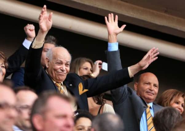 Hull City owner Assem Allam celebrating promotion.