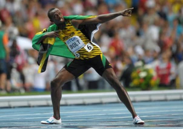 Jamaica's Usain Bolt celebrates winning the Men's 100m Final on day two of the 2013 IAAF World Athletics Championships at the Luzhniki Stadium in Moscow, Russia.