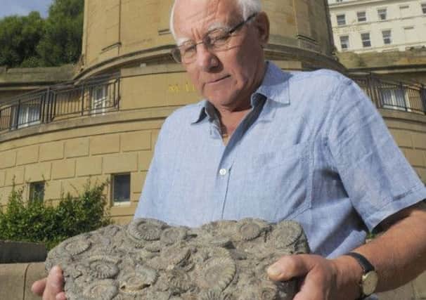 Professor Pete Rawson, chair of Scarborough Museums Trust, with a 200 million-year-old fossil block which has returned to Scarborough after over 50 years in Doncaster.