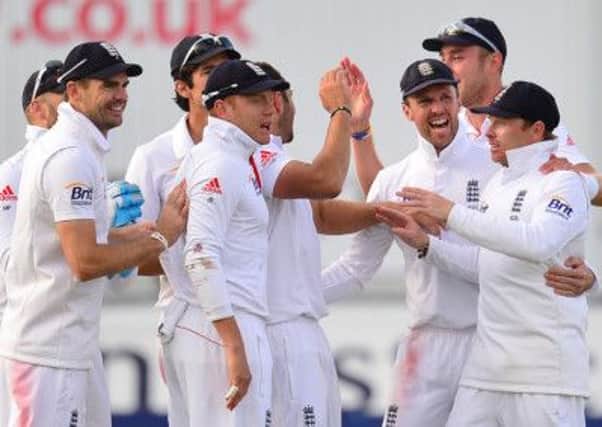 England's players celebrate the wicket of Shane Watson, bowled by Tim Bresnan during day four of the Fourth Investec Ashes test match at the Emirates Durham ICG, Durham.