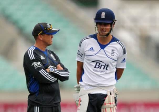 England's coach Andy Flower (left) and Alistair Cook