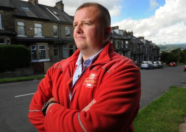 Postman Chad Dennison who took part in a neighbourhood resolution panel following a dog attack, rather than prosecute the owner.