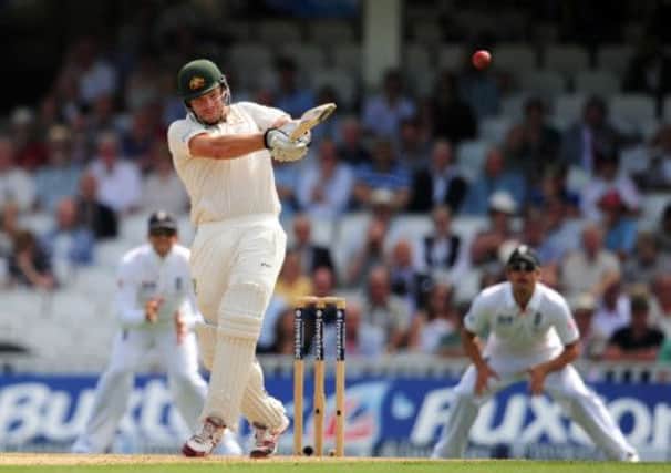 Australia's Shane Watson hits out for four runs