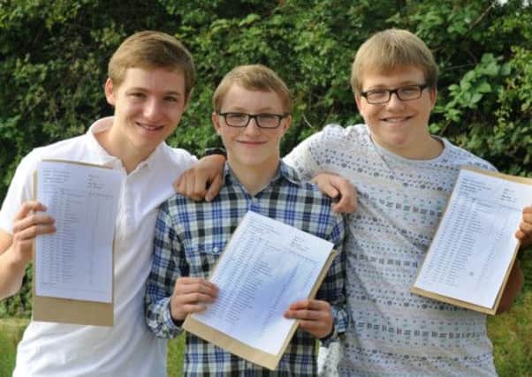 Harrogate Grammar School triplets Jack,Tom and Sam Mitchell  celebrate their GCSE results with a total of 27 A Star and 3 A's.