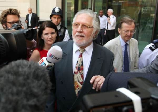 DJ Dave Lee Travis speaks to the media as he leaves Westminster Magistrates' Court. PIC: PA