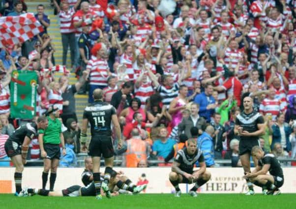 Hull FC after Sam Tomkins scores the Warriors second try. (Picture: Bruce Rollinson)