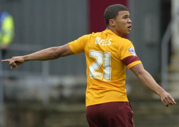 Bradford's Nahki Wells points the way to two goals, one in each half, to help the Bantams seal victory over Yorkshire rivals. (Picture: Mike Cowling)