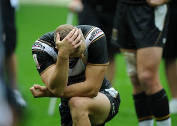 Jacob Miller at full time as Wigan celebrate. (Picture: Bruce Rollinson).
