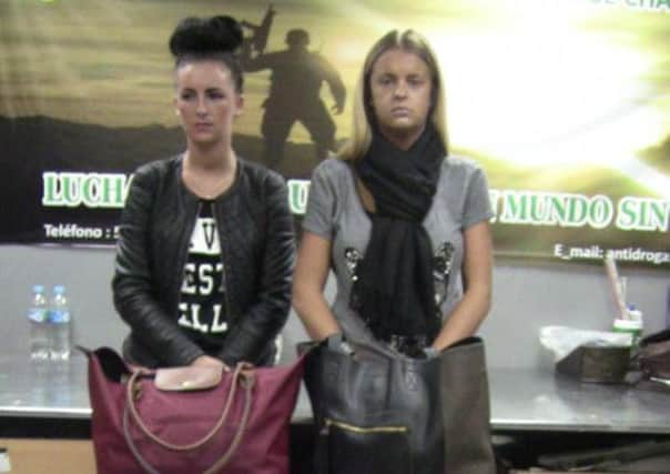HELD: Michaella McCollum, left, and Melissa Reid after their arrest at the airport.