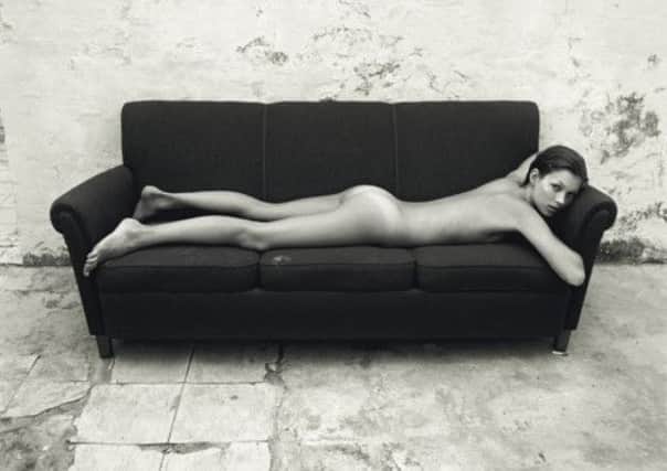 Mario Sorrenti's nude image of slimline Kate Moss in 1992.