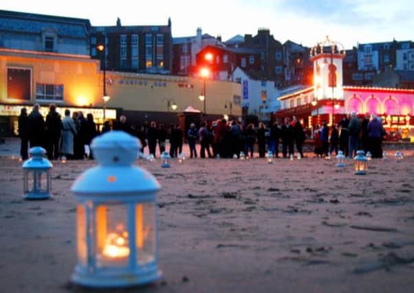 A beach vigil held for victim Michael Graham