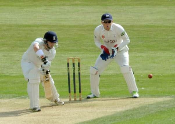IN THE RUNS: Yorkshire's Jonny Bairstow watches as Mark Stoneman from Durham makes his way towards a vital century in the County Championship encounter between the two title rivals at Scarborough. PICTURE: Gary Longbottom.